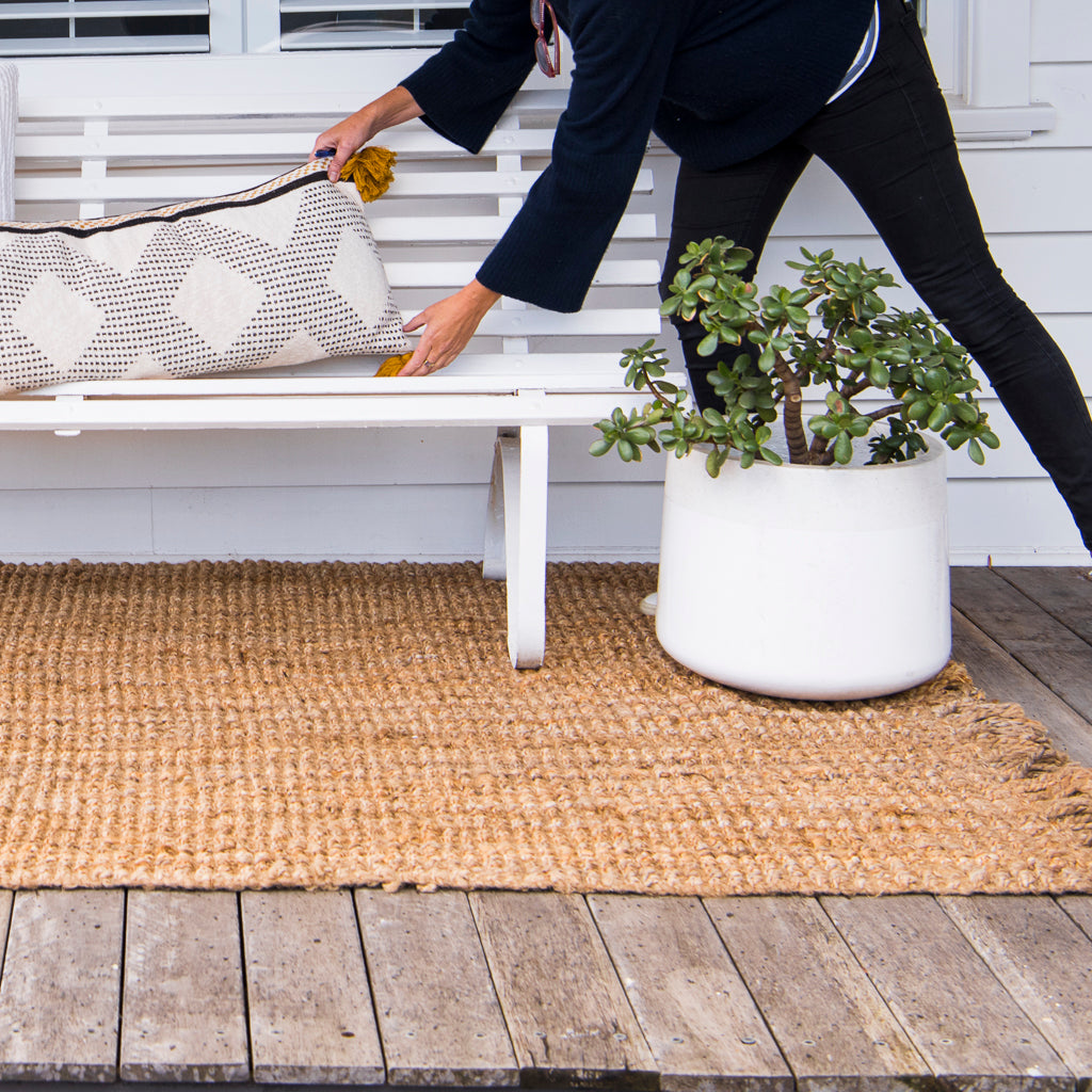 FRINGED RUG